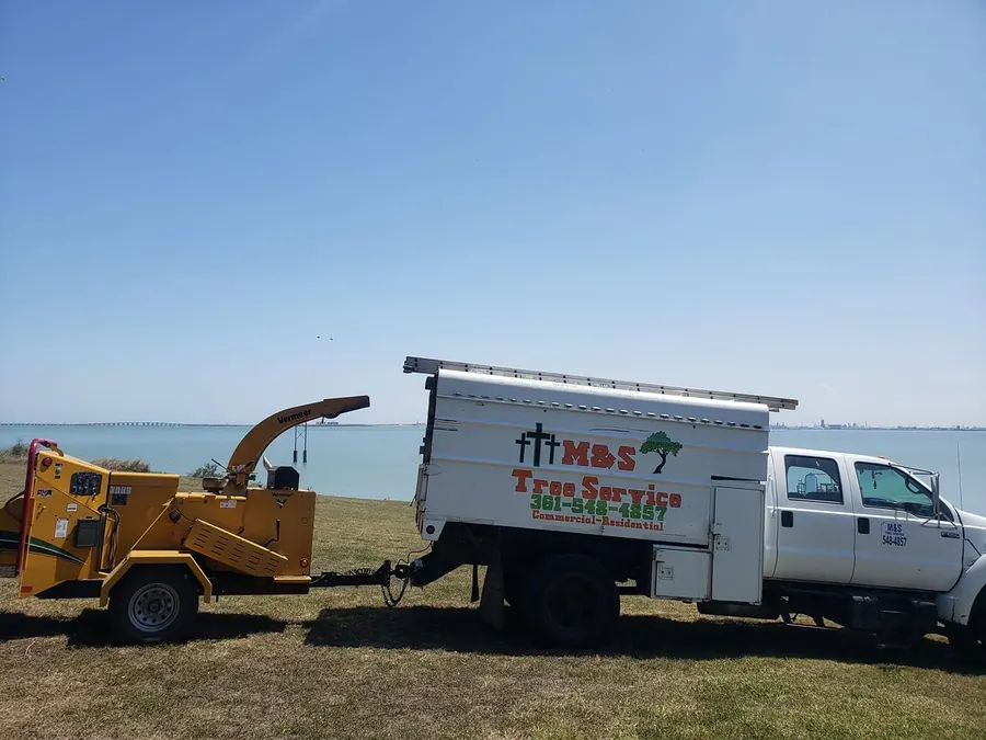 M&S truck and chipper by the bay